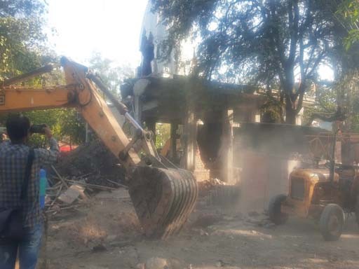 the bulldozer ran on the temple in indore 1680498718